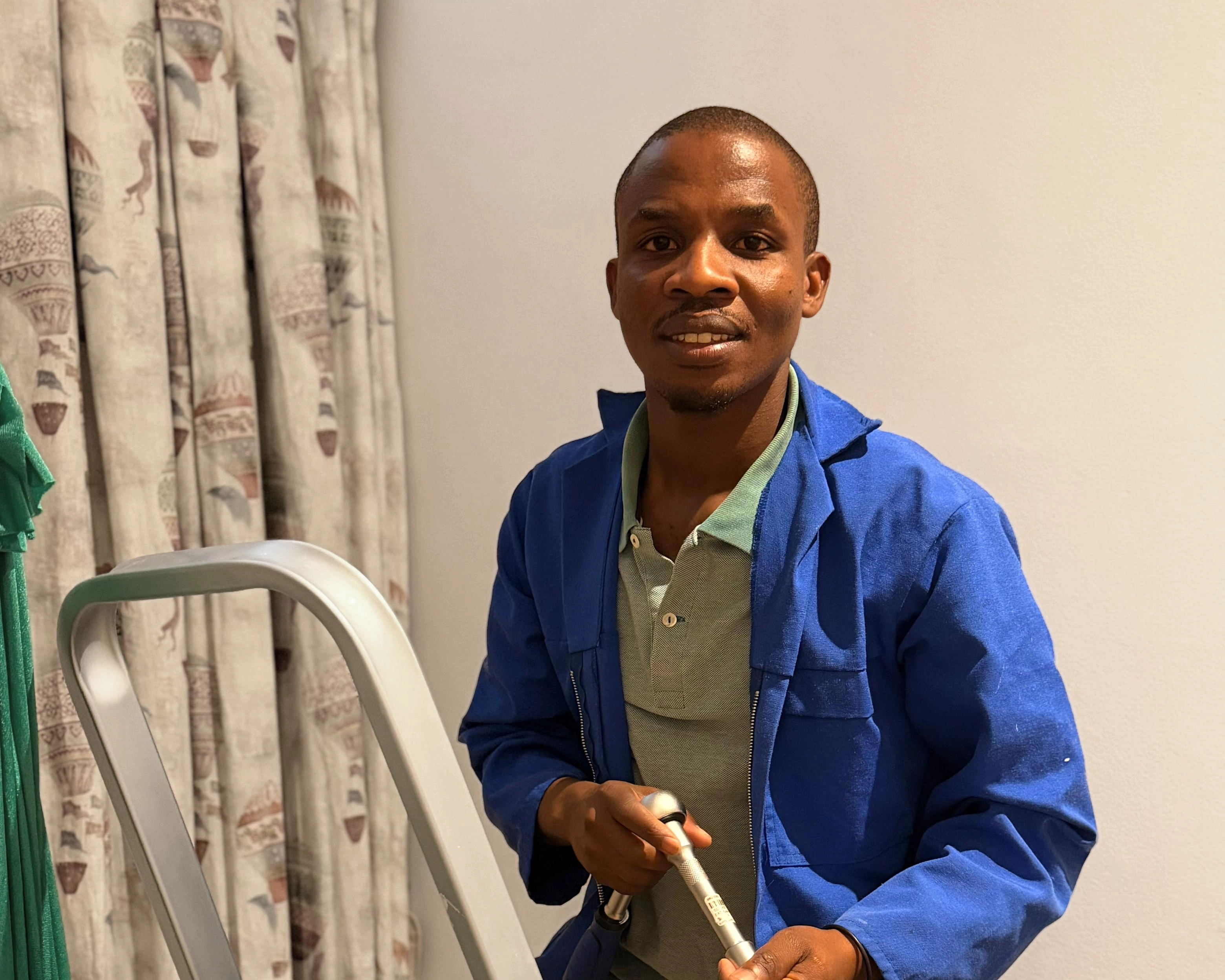 Maxwell professional handyman working in a Cape Town home